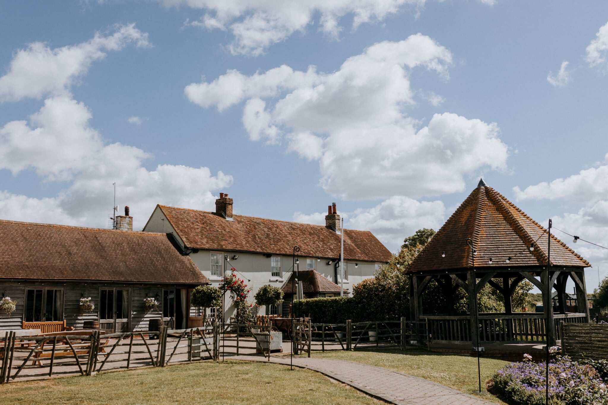 Exterior of the Hop Barn and The Ferry House, part of The Harty Estate wedding and events venue