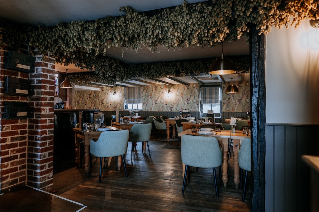 Dining room with hops overhead at The Harty Estate restaurant