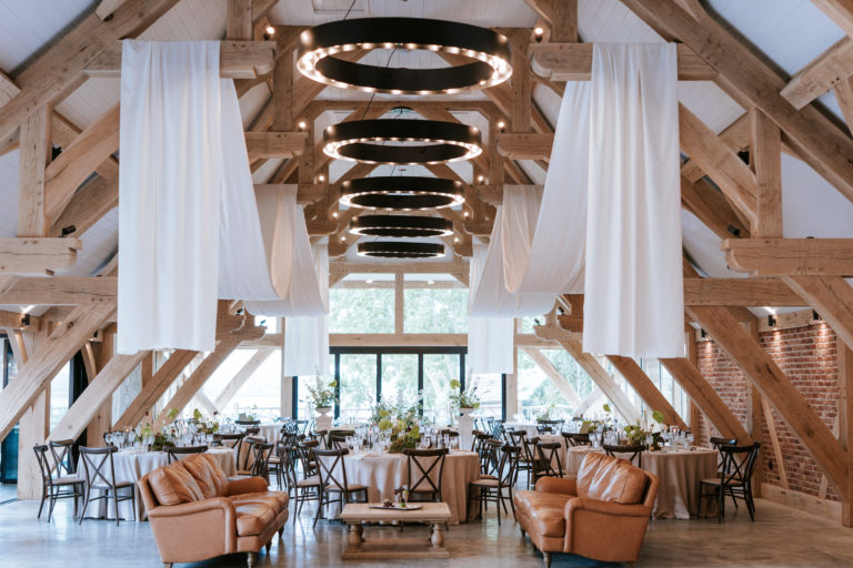 Artist's impression of Spring Barn at The Harty Estate wedding venue with oak beams and chandeliers