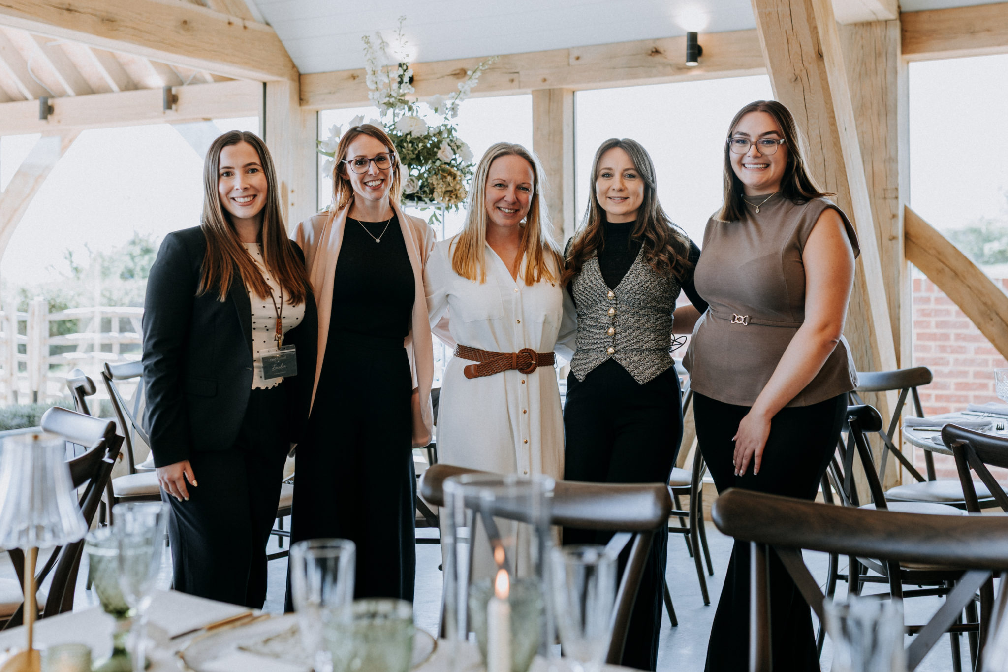 The Harty Estate wedding team standing in Spring Barn