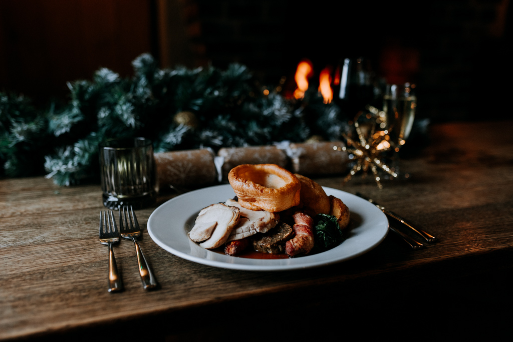 Roast turkey dinner with fetsive fireside table decor